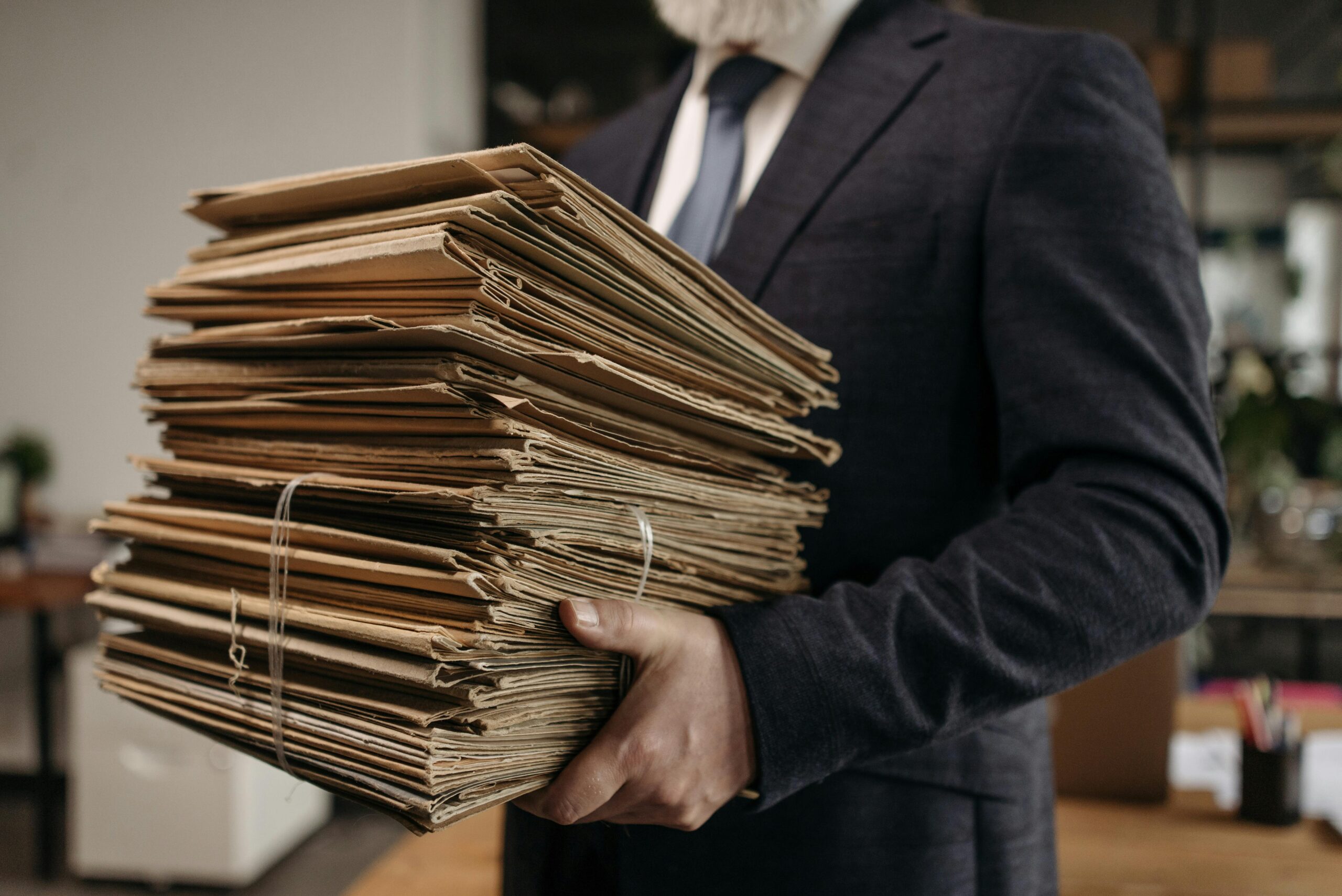 businessman holiday stack of business documents